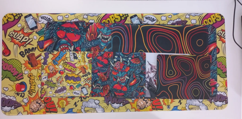 İlyuka Mouse Pad İncelemesi: Oyuncular İçin Yüksek Fiyat-Performans Mouse Pad! 2 Hangisi Alınmalı? ofisinden bir görüntü. Masa üzerinde farklı modellerde mouse pad modelleri inceleniyor.